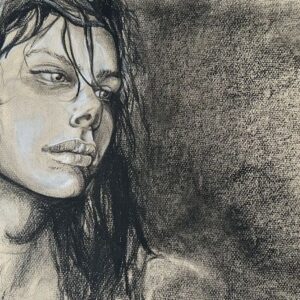 Charcoal drawing of a woman in profile with flowing hair, looking pensively to the side.